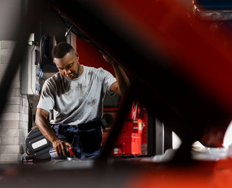 Technician performing transmission repair in Edmonton