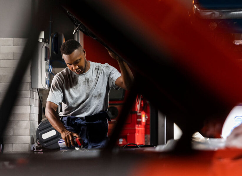 Technician performing transmission repair in Edmonton