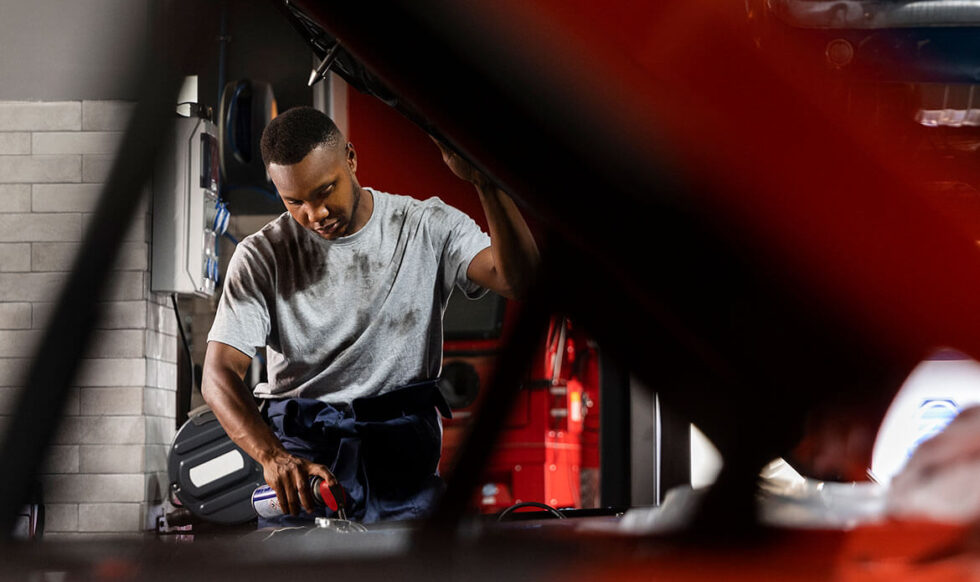 Technician performing transmission repair in Edmonton